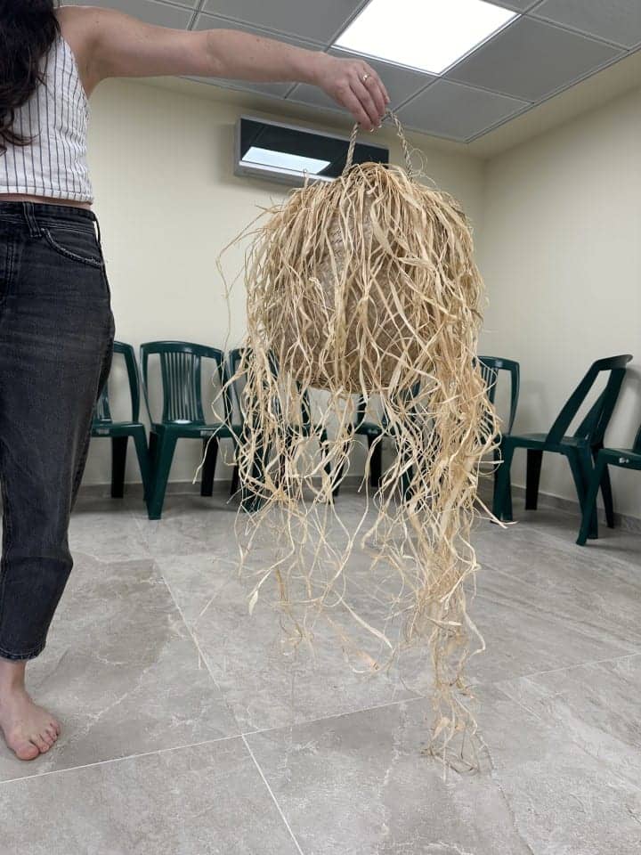 A raffia piece in progress.