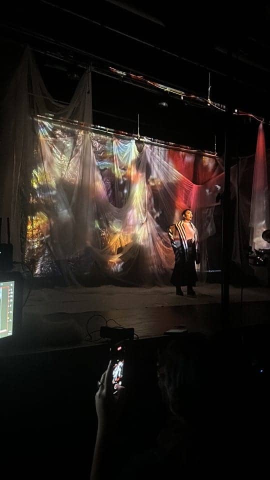 Projection on the drapes.