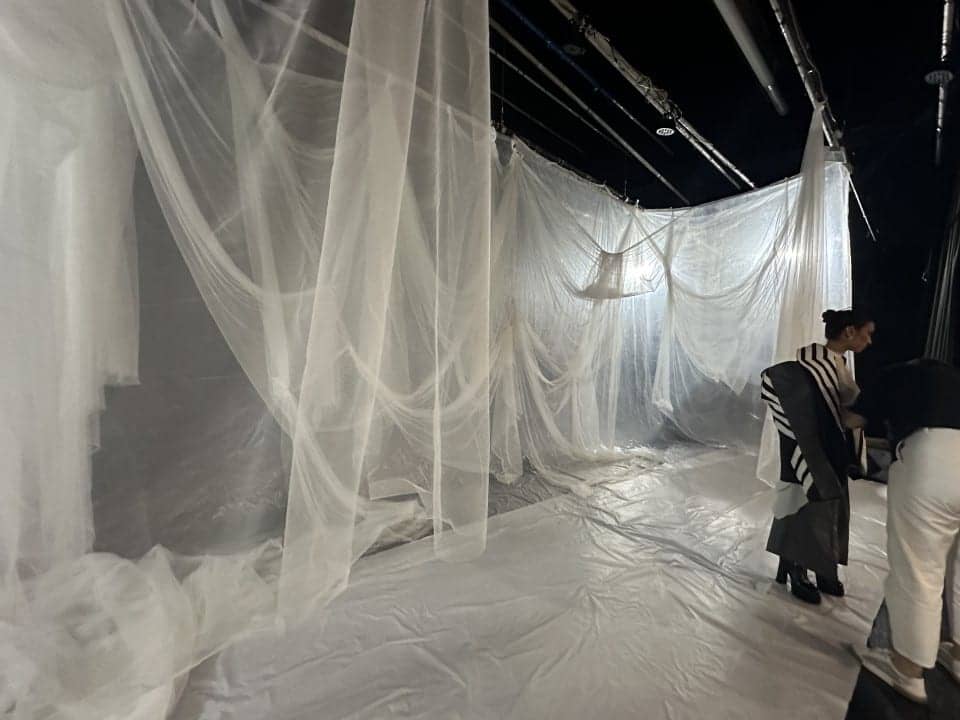 Hanging the tulle.