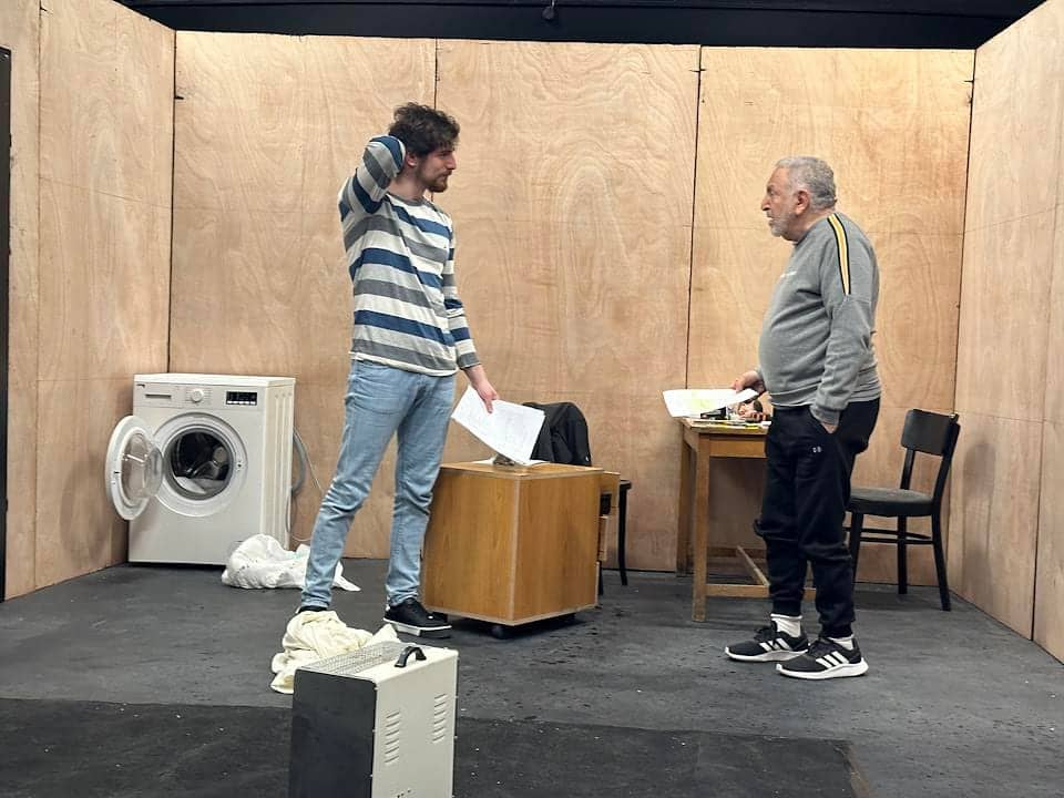 Rehearsing in the set.